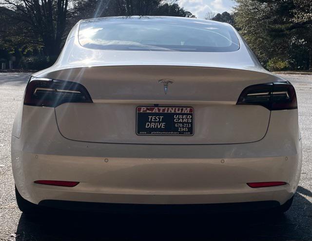 used 2022 Tesla Model 3 car, priced at $23,499