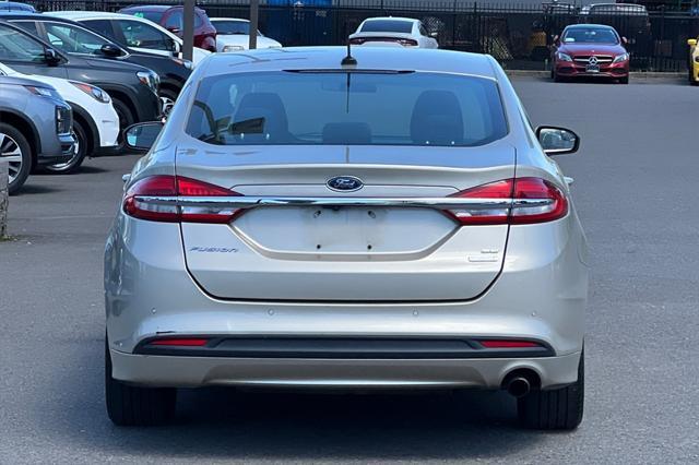 used 2018 Ford Fusion car, priced at $15,048