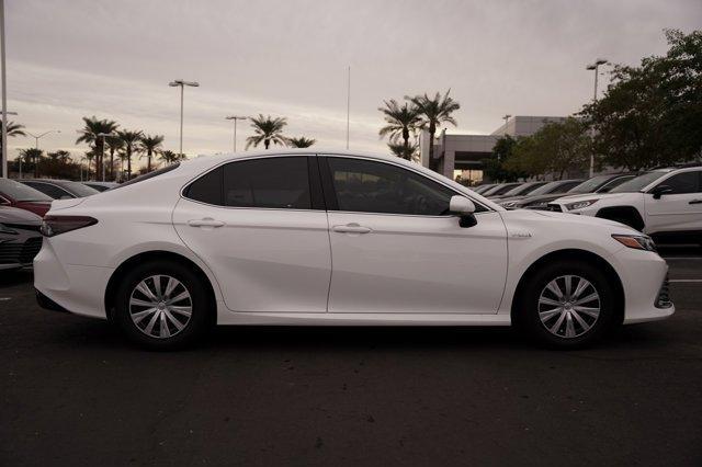 new 2024 Toyota Camry Hybrid car, priced at $30,318