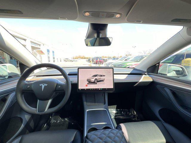 used 2023 Tesla Model Y car, priced at $28,500