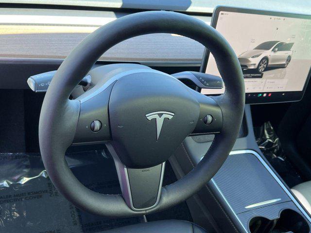 used 2023 Tesla Model Y car, priced at $28,500