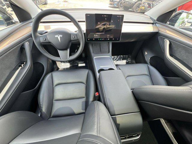 used 2023 Tesla Model Y car, priced at $27,000