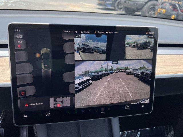 used 2023 Tesla Model Y car, priced at $27,000