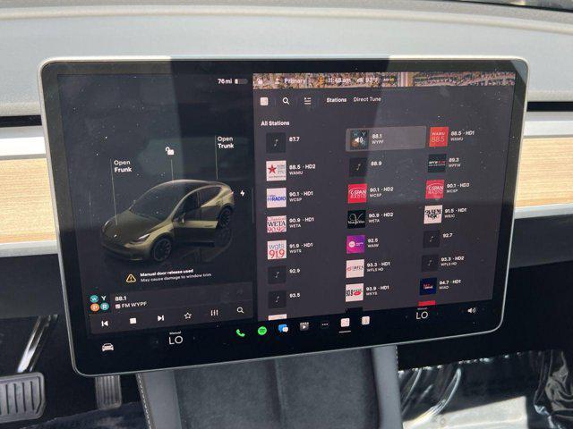 used 2023 Tesla Model Y car, priced at $27,000