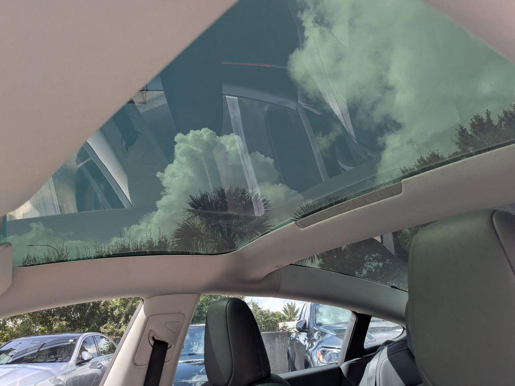 used 2025 Tesla Model 3 car, priced at $34,991