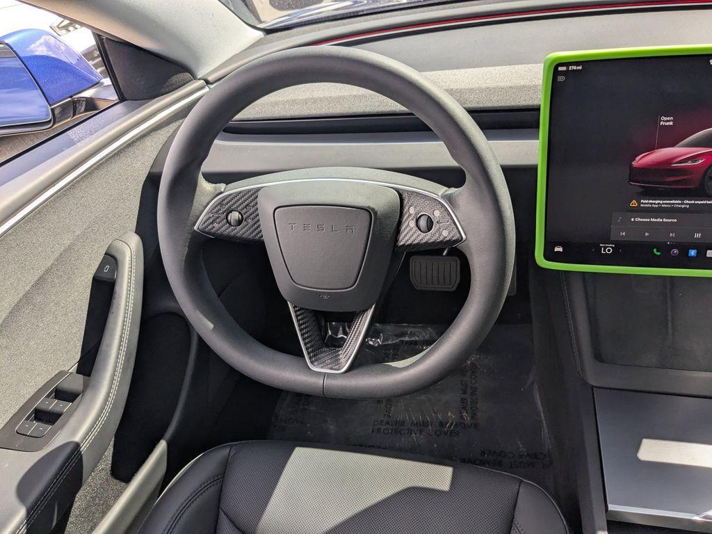 used 2025 Tesla Model 3 car, priced at $34,991