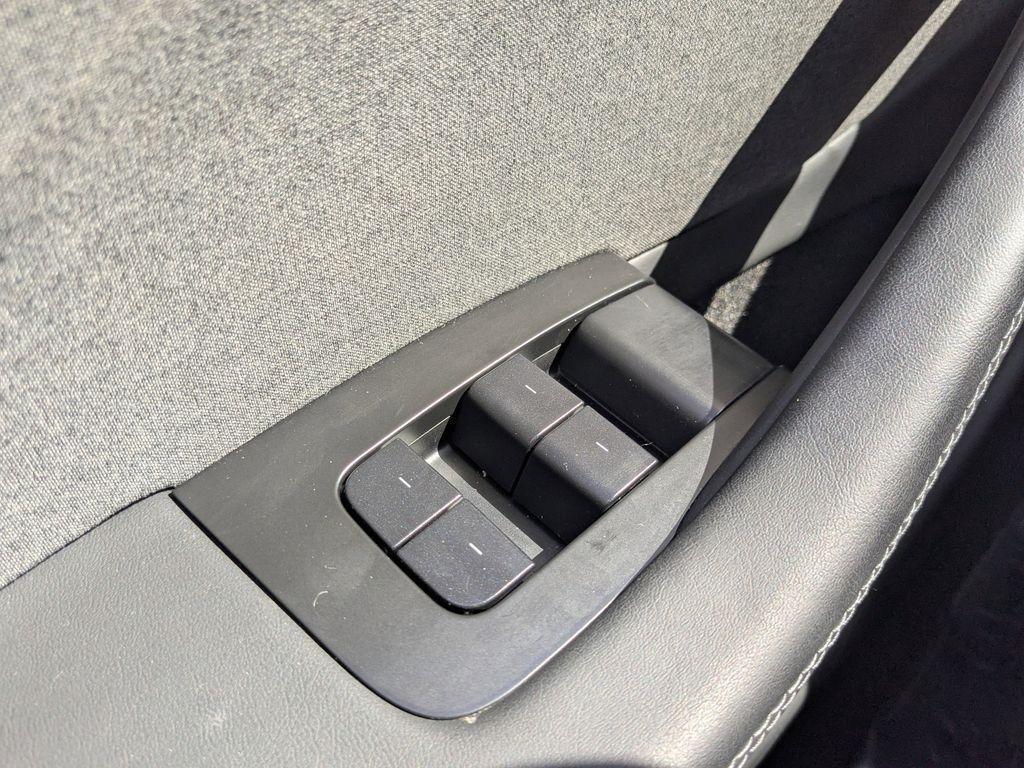 used 2025 Tesla Model 3 car, priced at $34,991