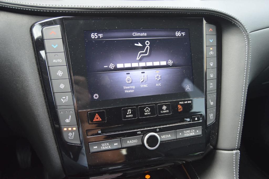 used 2025 INFINITI QX50 car, priced at $44,999