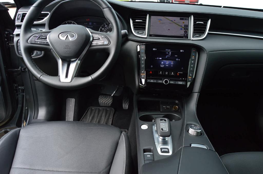 used 2025 INFINITI QX50 car, priced at $43,499