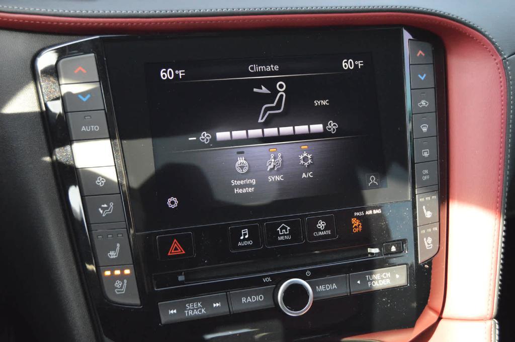 used 2025 INFINITI QX50 car, priced at $41,999