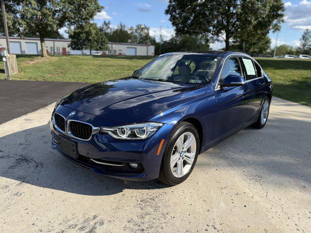 used 2018 BMW 330 car, priced at $17,402