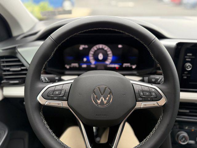 new 2025 Volkswagen Taos car, priced at $28,821