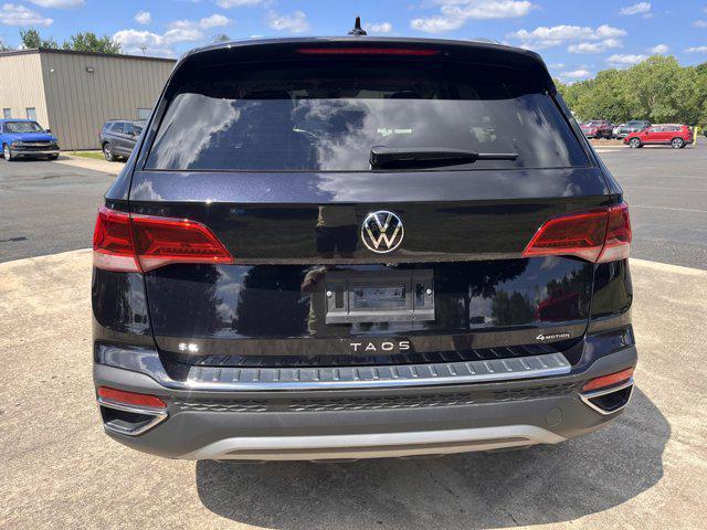 new 2024 Volkswagen Taos car, priced at $28,606