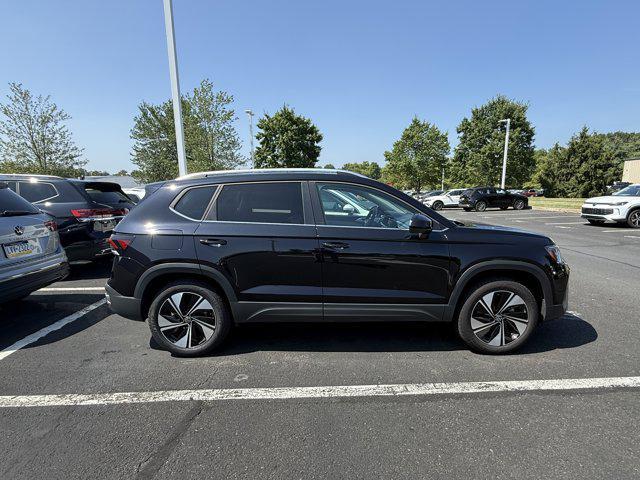 used 2025 Volkswagen Taos car, priced at $29,828