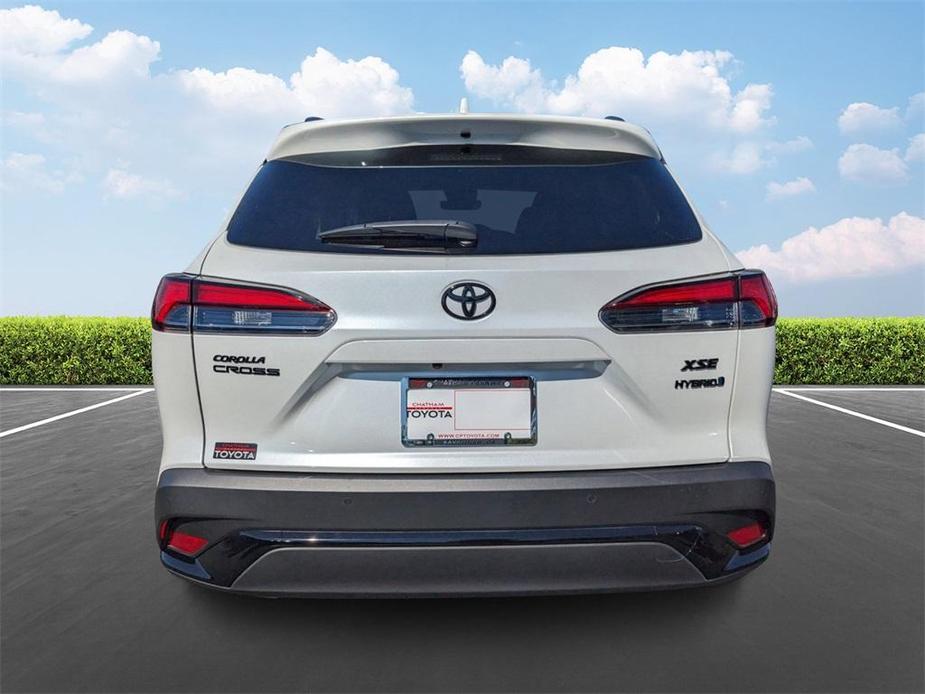 used 2023 Toyota Corolla Cross Hybrid car, priced at $32,997