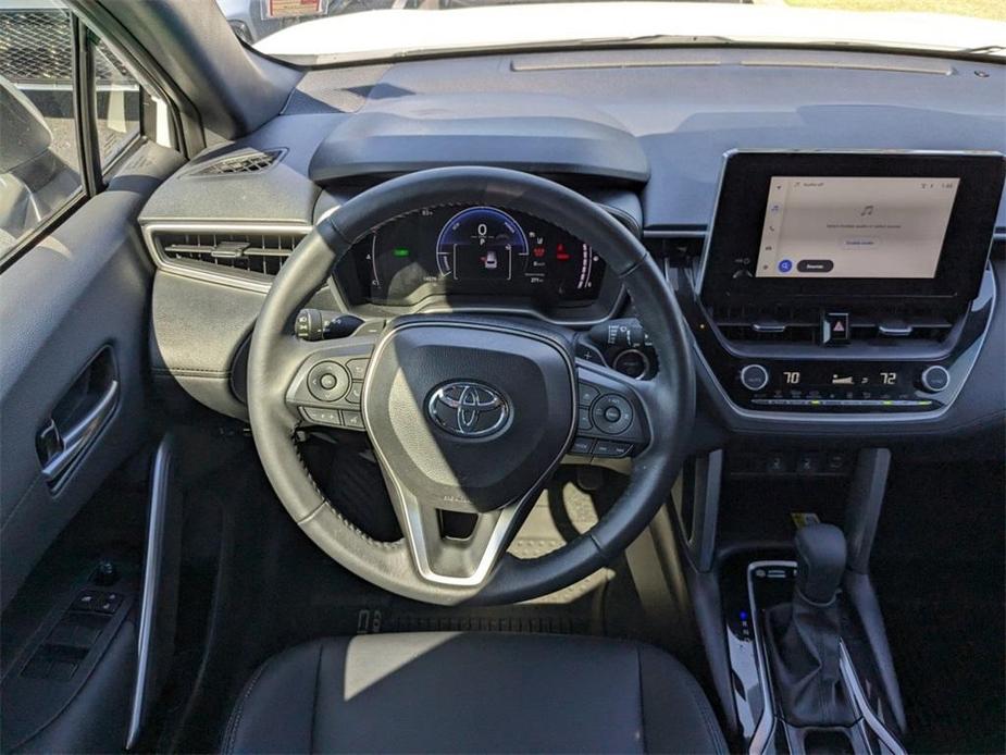 used 2023 Toyota Corolla Cross Hybrid car, priced at $32,997