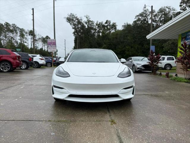 used 2022 Tesla Model 3 car, priced at $30,700