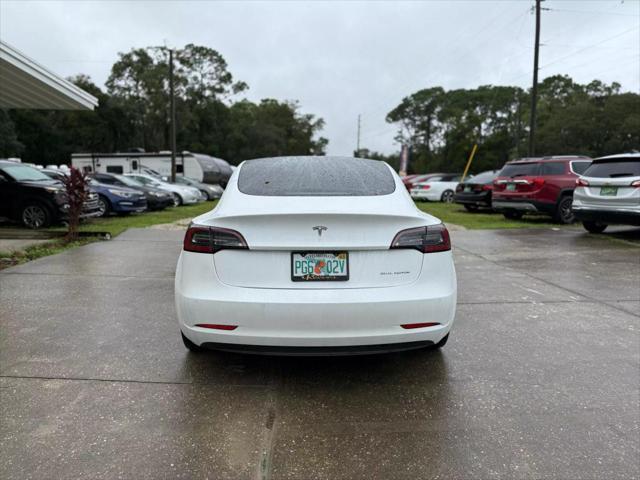 used 2022 Tesla Model 3 car, priced at $30,700