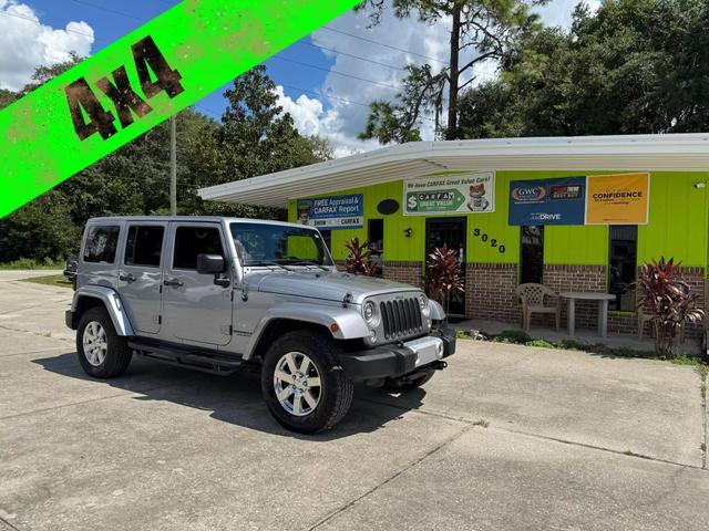 used 2014 Jeep Wrangler Unlimited car, priced at $16,295