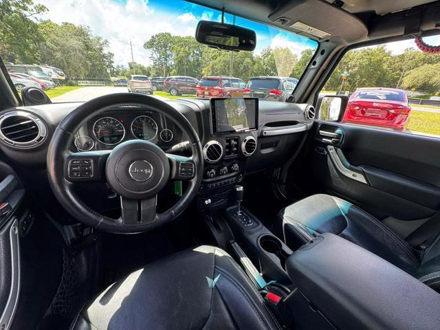 used 2014 Jeep Wrangler Unlimited car, priced at $16,295