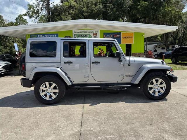 used 2014 Jeep Wrangler Unlimited car, priced at $16,295