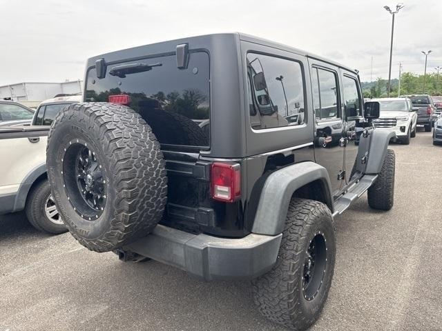 used 2015 Jeep Wrangler Unlimited car, priced at $17,700