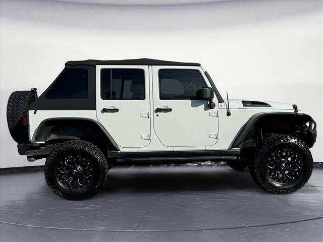 used 2012 Jeep Wrangler Unlimited car, priced at $17,700