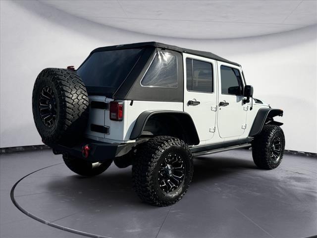 used 2012 Jeep Wrangler Unlimited car, priced at $17,700