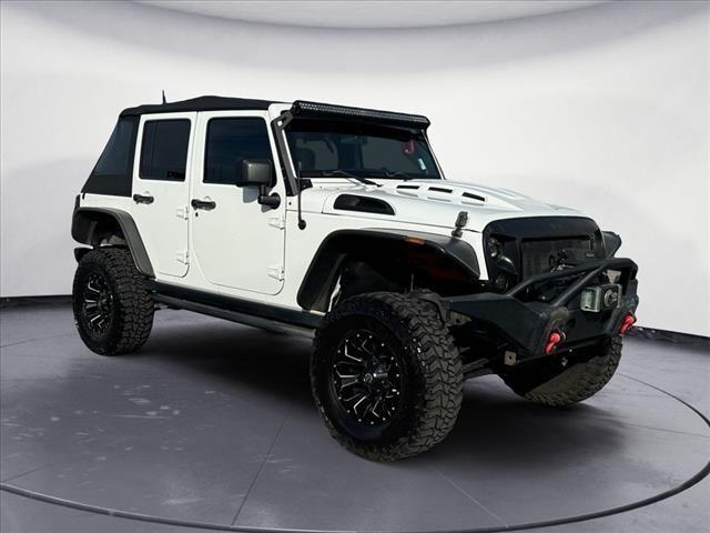 used 2012 Jeep Wrangler Unlimited car, priced at $17,700