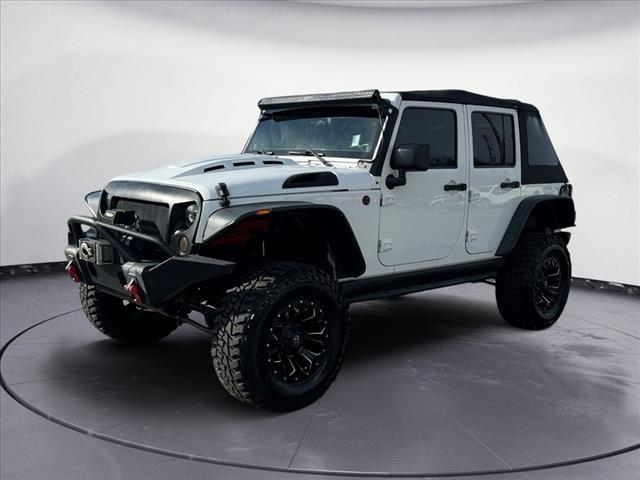 used 2012 Jeep Wrangler Unlimited car, priced at $17,700