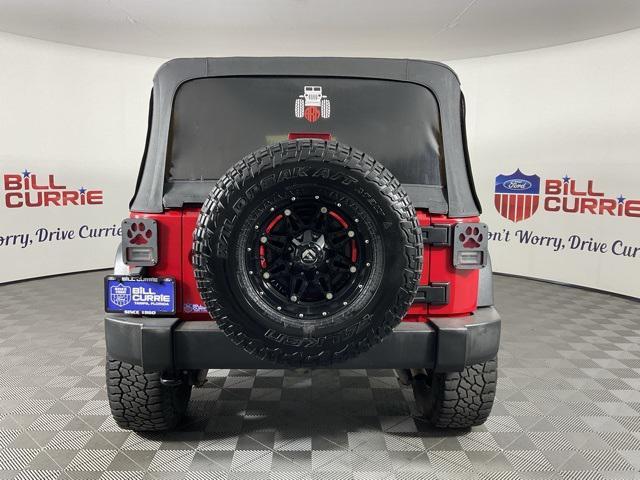 used 2016 Jeep Wrangler Unlimited car, priced at $15,022