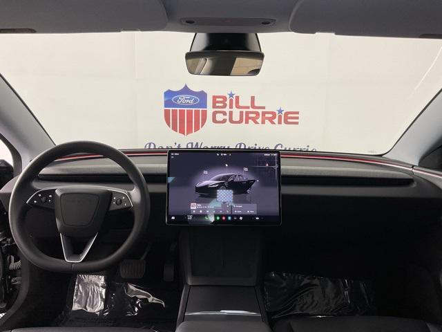 used 2025 Tesla Model 3 car, priced at $35,679