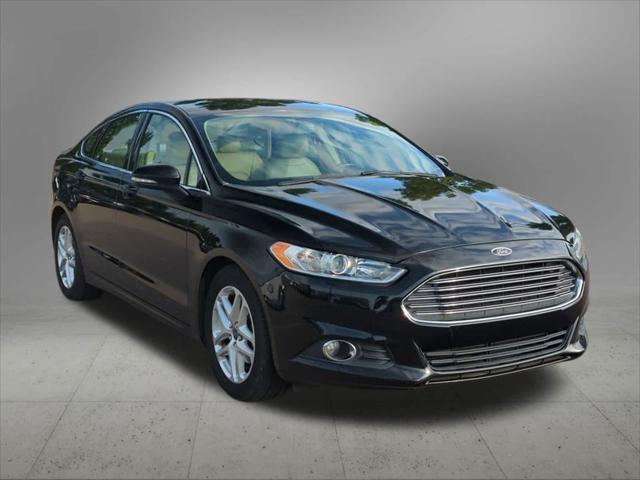 used 2016 Ford Fusion car, priced at $9,122