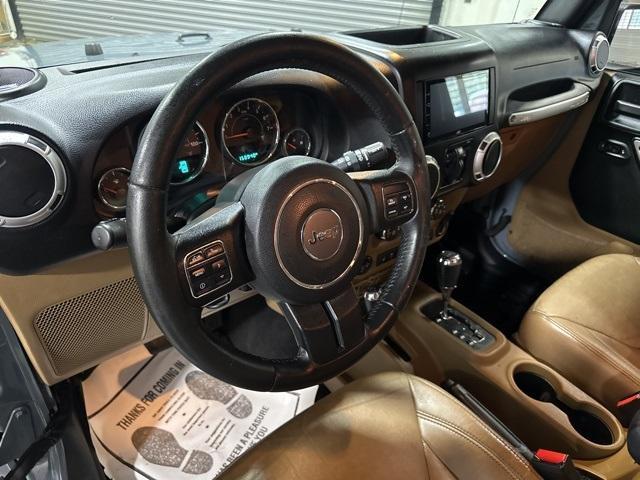 used 2015 Jeep Wrangler Unlimited car, priced at $16,900
