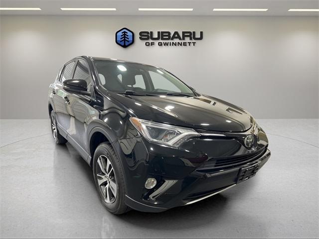 used 2018 Toyota RAV4 car, priced at $17,100