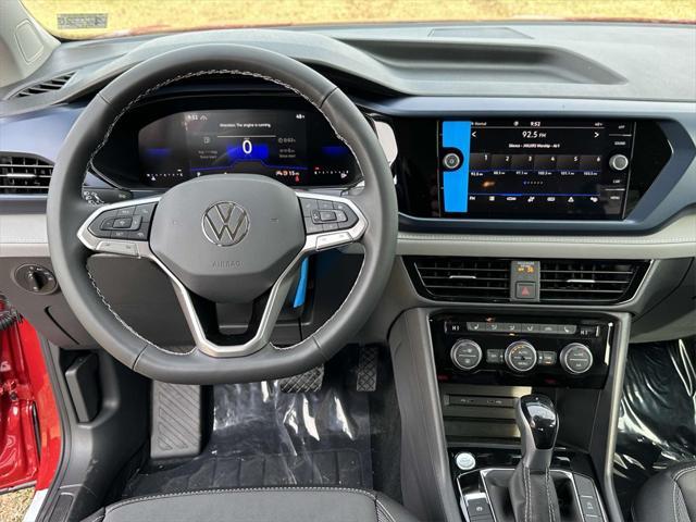 new 2024 Volkswagen Taos car, priced at $29,702