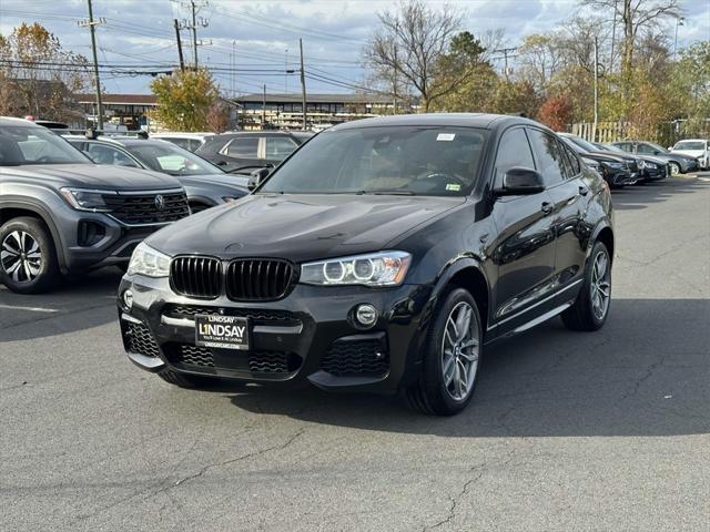 used 2018 BMW X4 car, priced at $22,997