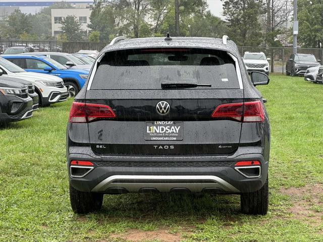 new 2024 Volkswagen Taos car, priced at $32,104