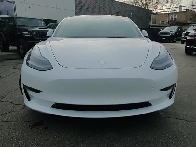 used 2023 Tesla Model 3 car, priced at $26,489