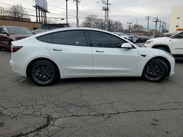 used 2023 Tesla Model 3 car, priced at $26,489