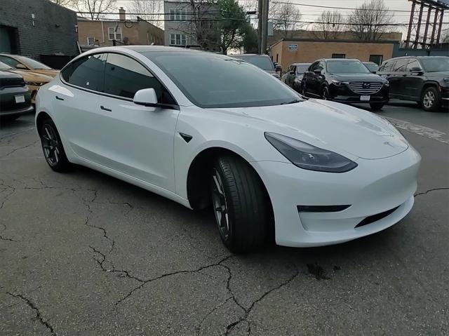 used 2023 Tesla Model 3 car, priced at $26,489