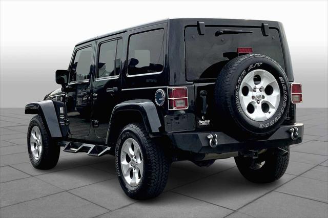 used 2013 Jeep Wrangler Unlimited car, priced at $14,495