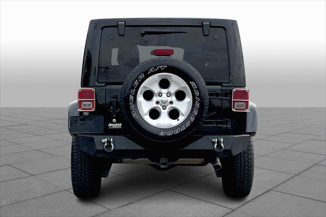 used 2013 Jeep Wrangler Unlimited car, priced at $14,495