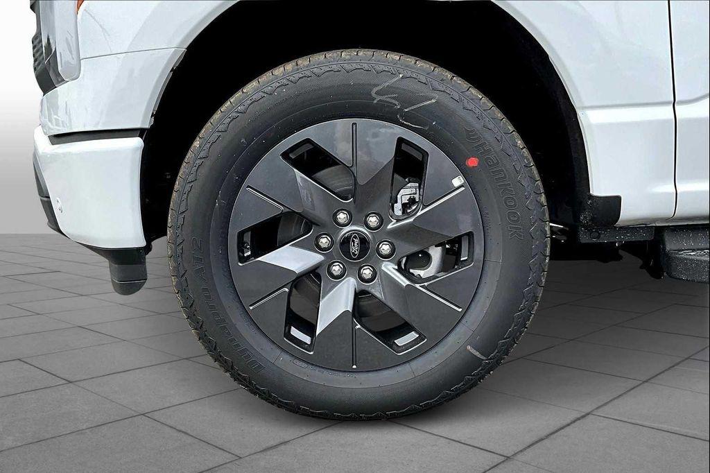 new 2025 Ford F-150 Lightning car, priced at $65,836