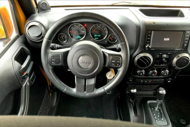 used 2014 Jeep Wrangler Unlimited car, priced at $17,195