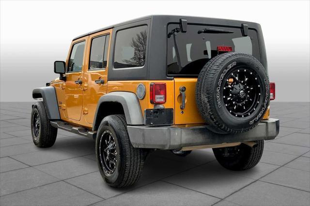 used 2014 Jeep Wrangler Unlimited car, priced at $17,195