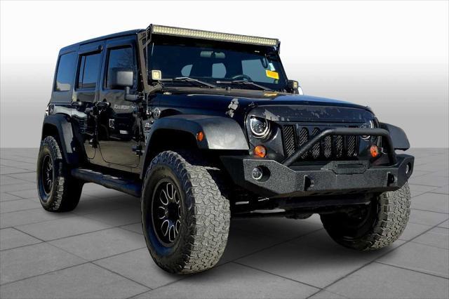 used 2013 Jeep Wrangler Unlimited car, priced at $16,615