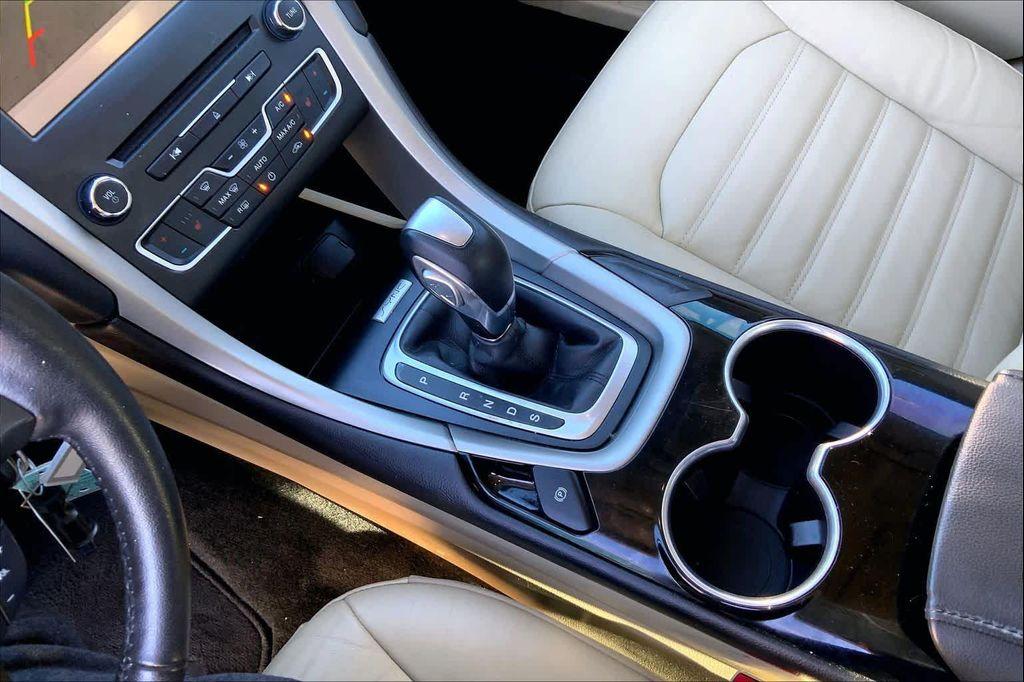 used 2016 Ford Fusion car, priced at $7,742