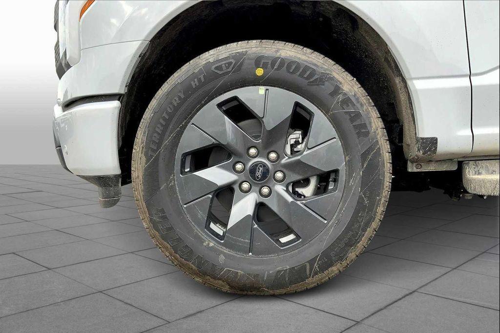 new 2025 Ford F-150 Lightning car, priced at $65,432