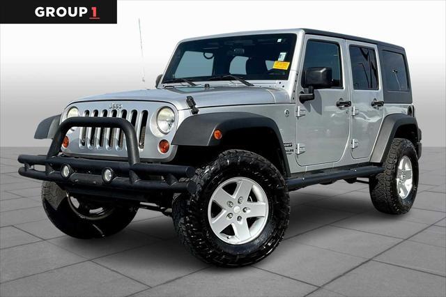 used 2011 Jeep Wrangler Unlimited car, priced at $13,948